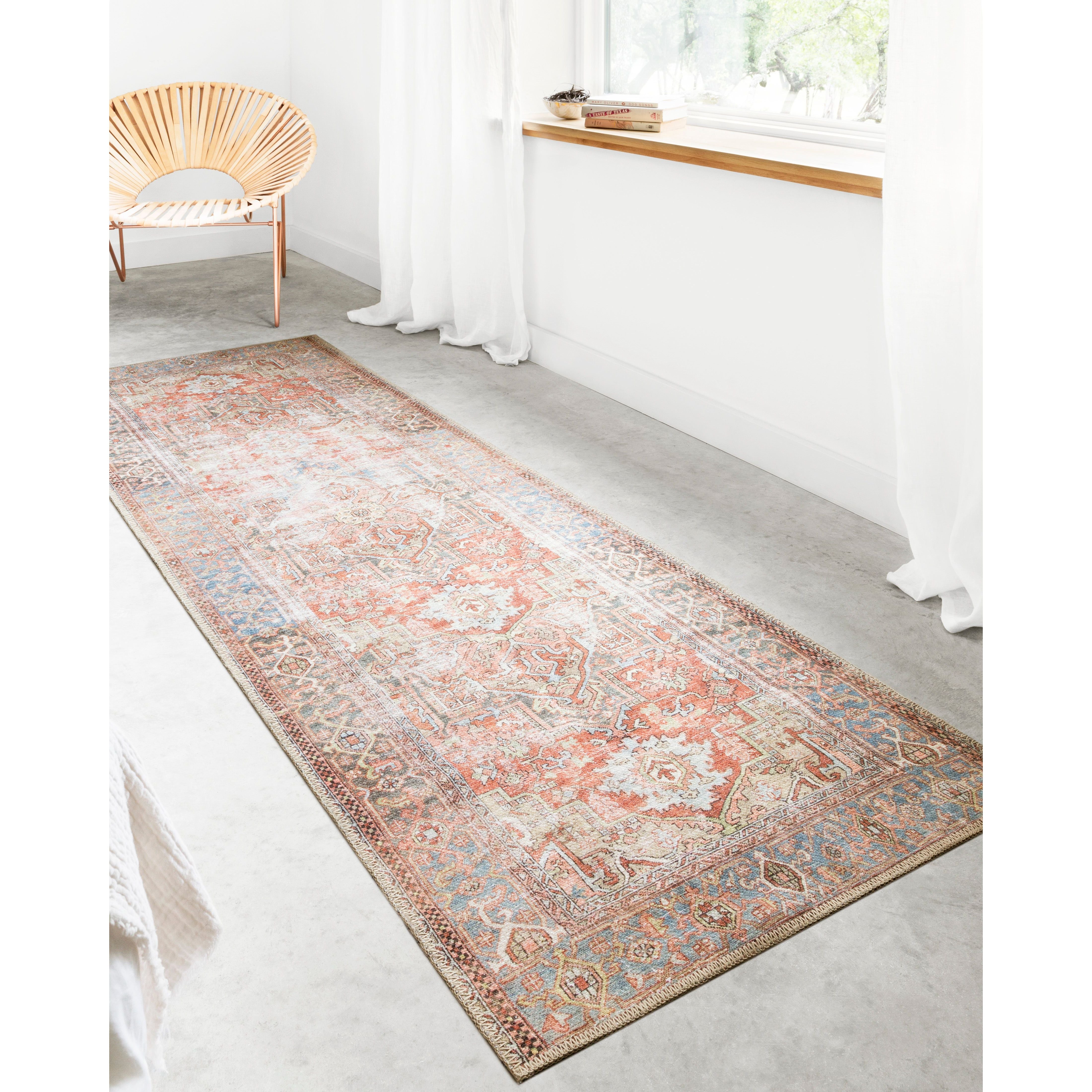 Perfect for families with kids and pets and very easy to clean and maintain. Comes in area, cute kitchen and hallway runner sizes. The rug warms up any room with tones of red, blue, and ivory. The Loren Terracotta / Sky rug from Loloi captures the spirit of a one-of-a-kind vintage and antique area rug.