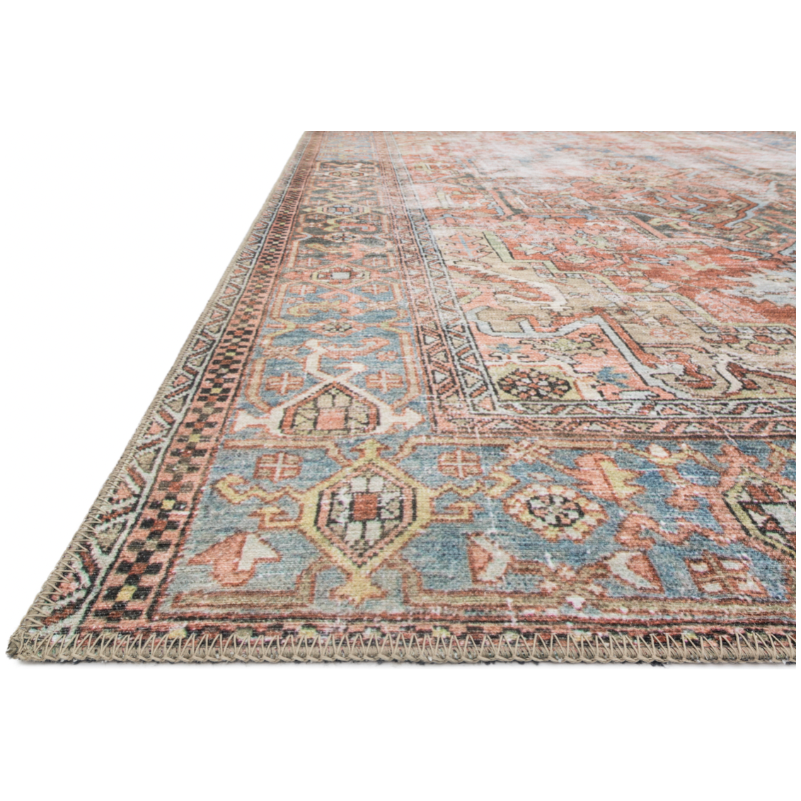 Perfect for families with kids and pets and very easy to clean and maintain. Comes in area, cute kitchen and hallway runner sizes. The rug warms up any room with tones of red, blue, and ivory. The Loren Terracotta / Sky rug from Loloi captures the spirit of a one-of-a-kind vintage and antique area rug.