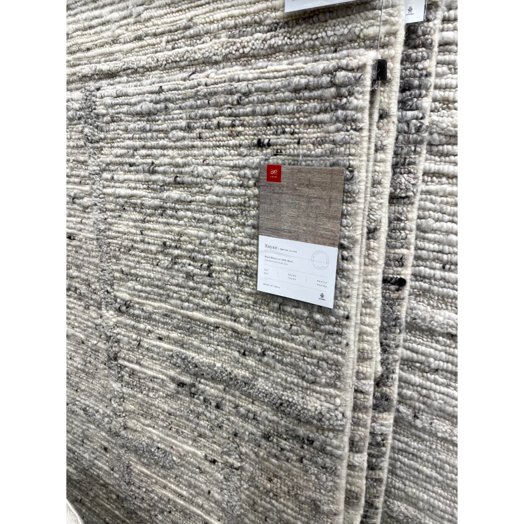 Featuring Rayan Silver Rug by Loloi at Amethyst Home. Hand-woven of 100% wool in India, the Rayan Silver Area Rug sets the tone for a calming atmosphere. Each design is crafted of textural highs and lows paired with neutral tones to create and engaging understatement. The perfect rug for your bedroom, office, or other medium traffic area. 
Hand Woven93% Woo.  Amethyst Home provides interior design, new home construction design consulting, vintage area rugs, and lighting in the Portland metro area.