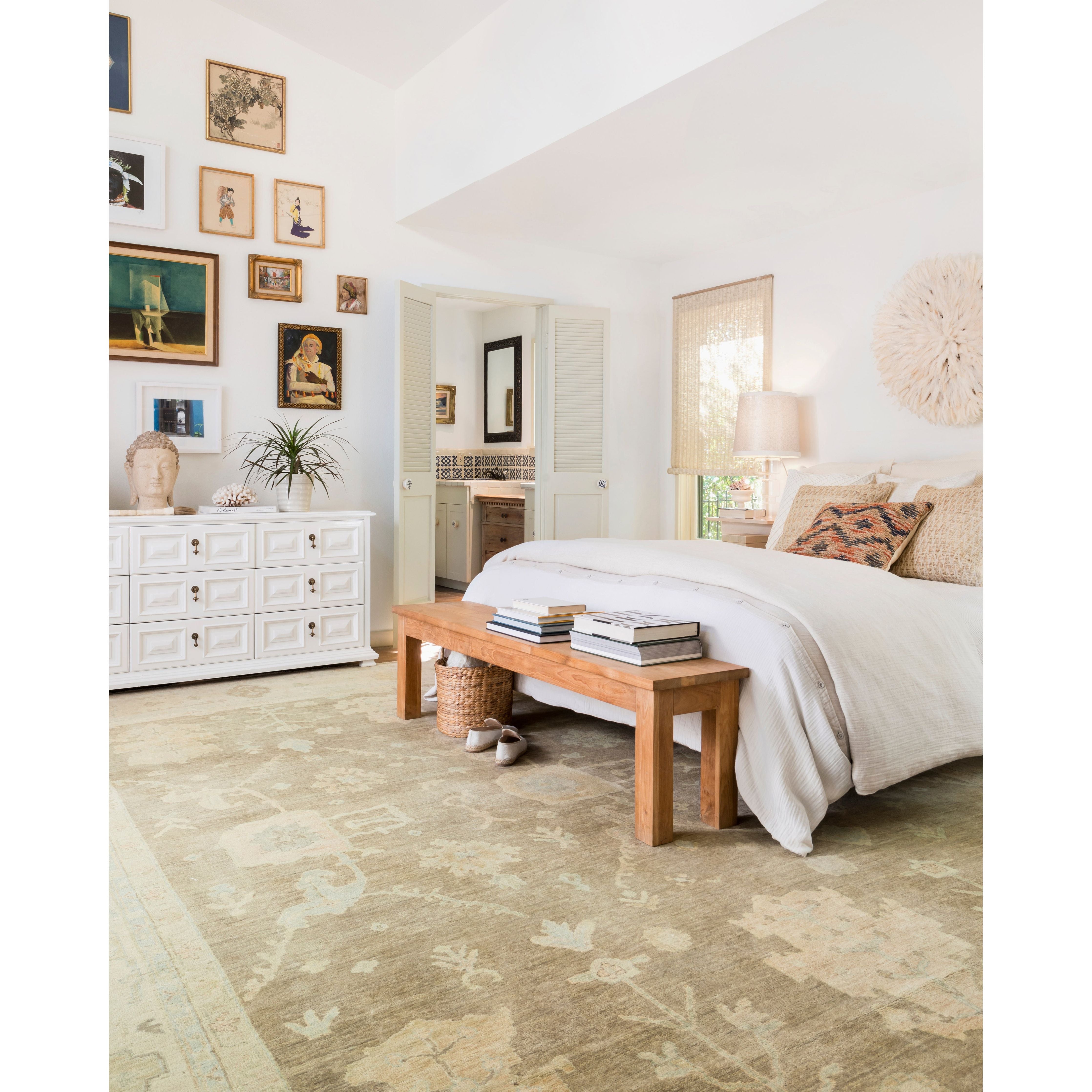 Hand knotted of 100% wool by skilled artisans, the Loloi Vincent Moss Gray /Stone Area Rug, or VC-02, offers the look of a well-worn antique rug in a modern day color palette. Each exquisite piece undergoes a weeks-long antique washing process which fades the pattern and color beautifully. 
