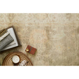 Hand knotted of 100% wool by skilled artisans, the Loloi Vincent Moss Gray /Stone Area Rug, or VC-02, offers the look of a well-worn antique rug in a modern day color palette. Each exquisite piece undergoes a weeks-long antique washing process which fades the pattern and color beautifully. 