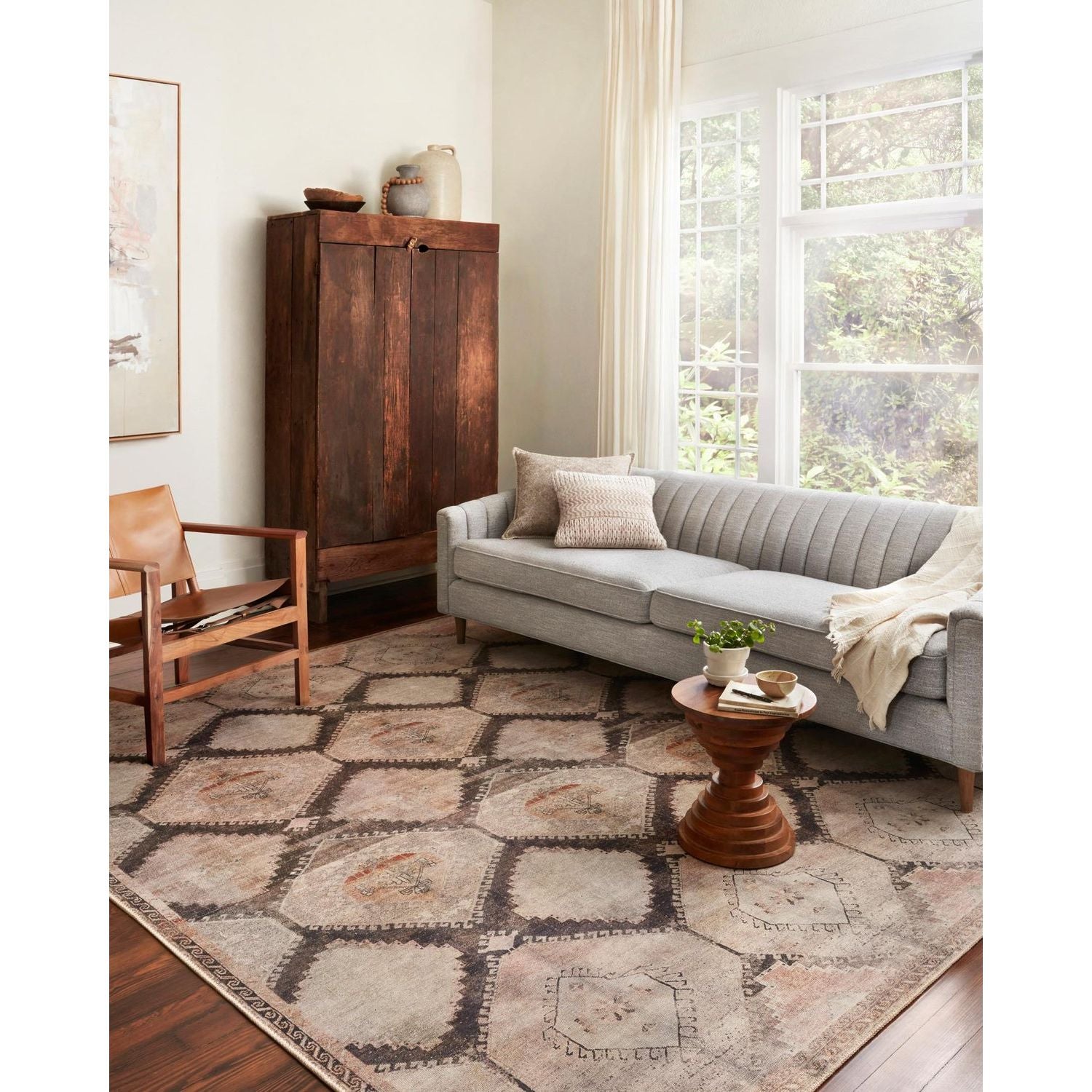 Old soul, new spirit. Power-loomed of 100% polyester, the Wynter Graphite / Blush Area Rug showcases a one-of-a-kind vintage or antique area rug look at an affordable price. The rug is perfect for living rooms, dining rooms, kitchens, hallways, and entryways.  Power Loomed 100% Polyester WYN-08 Graphite/Blush