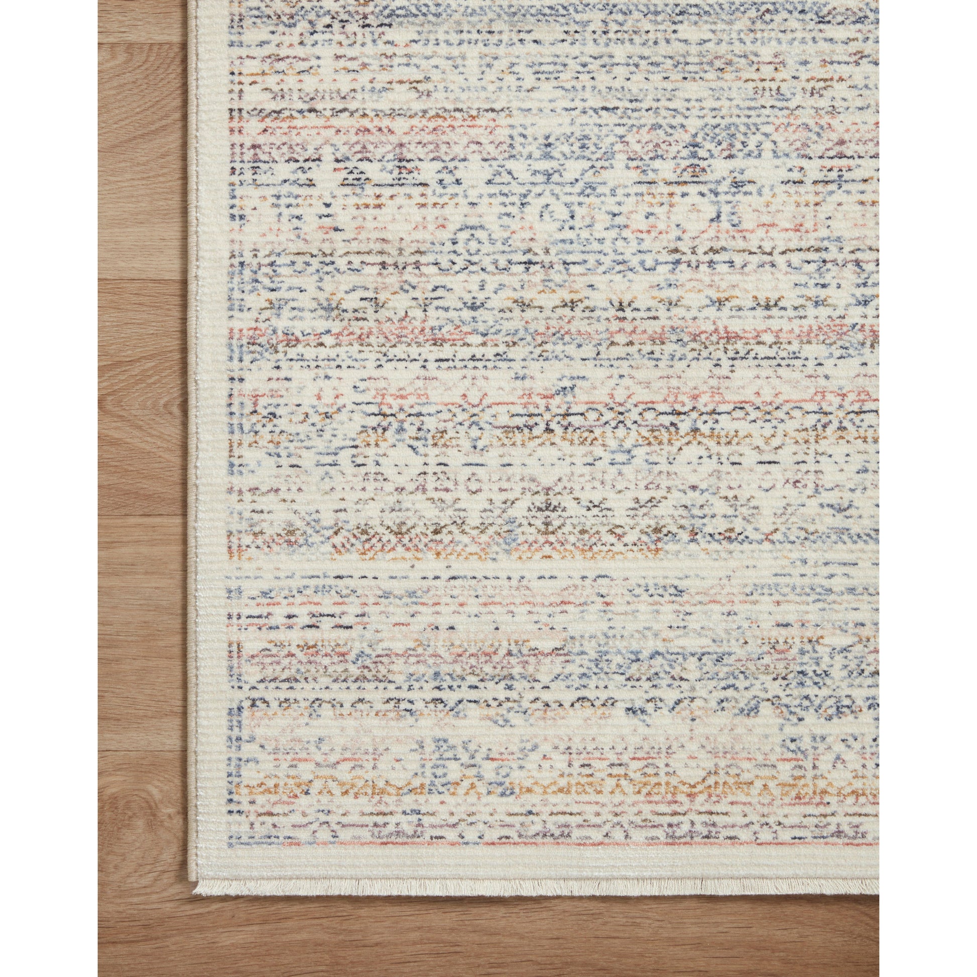 Stain-resistant, fade-resistant, and long-lasting, the Zuma Collection for Amber Lewis x Loloi features a soft pile in a serene grey, blue and ivory palette. Zuma also carries the Okeo-Tex® label, ensuring the rug's materials do not contain harmful substances. Power Loomed 100% Polyester Pile ZUM-01 AL Ivory / Multi