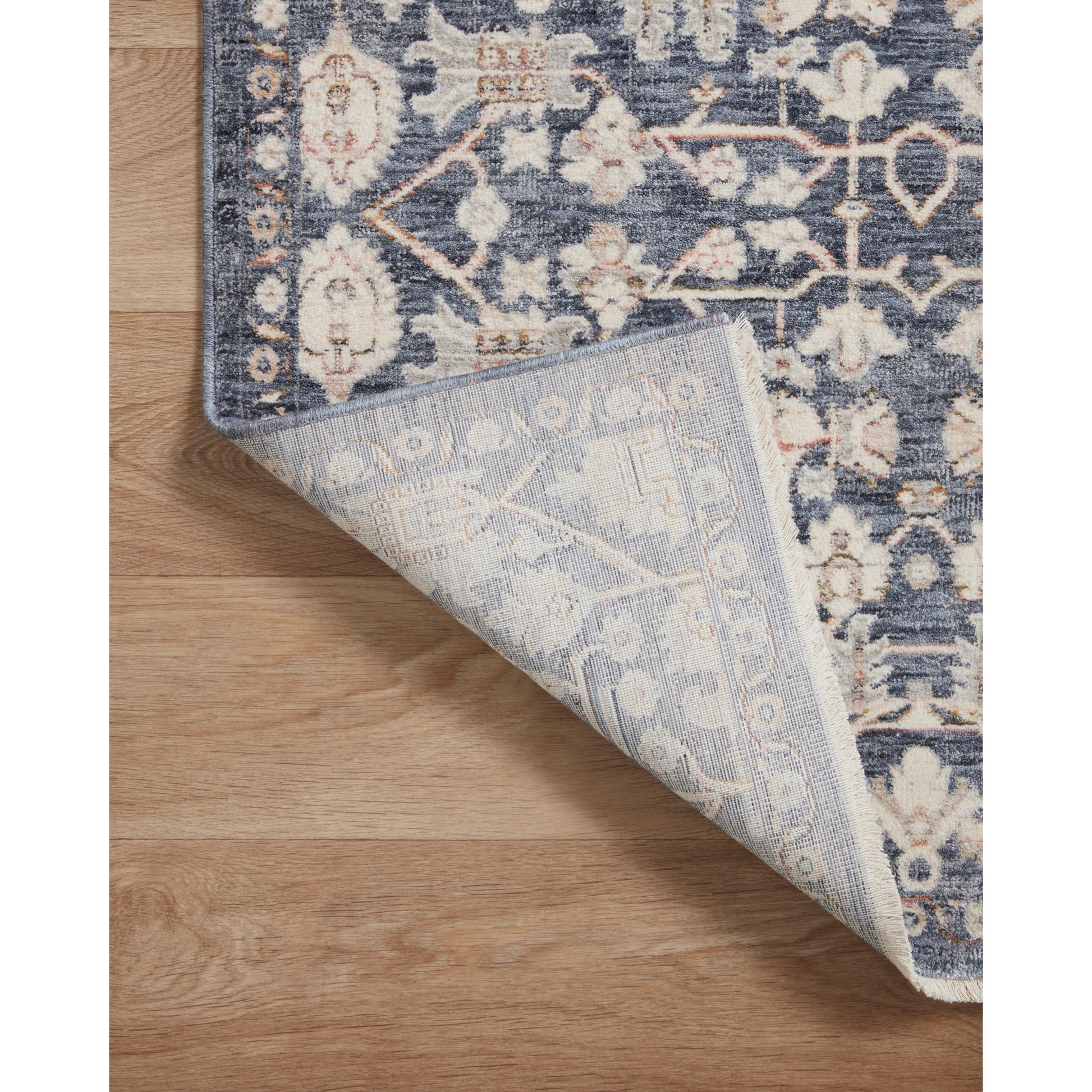 Stain-resistant, fade-resistant, and long-lasting, the Zuma Collection for Amber Lewis x Loloi features a soft pile in a serene grey, blue and ivory palette. Zuma also carries the Okeo-Tex® label, ensuring the rug's materials do not contain harmful substances. Power Loomed 100% Polyester Pile ZUM-02 AL Blue / Ivory