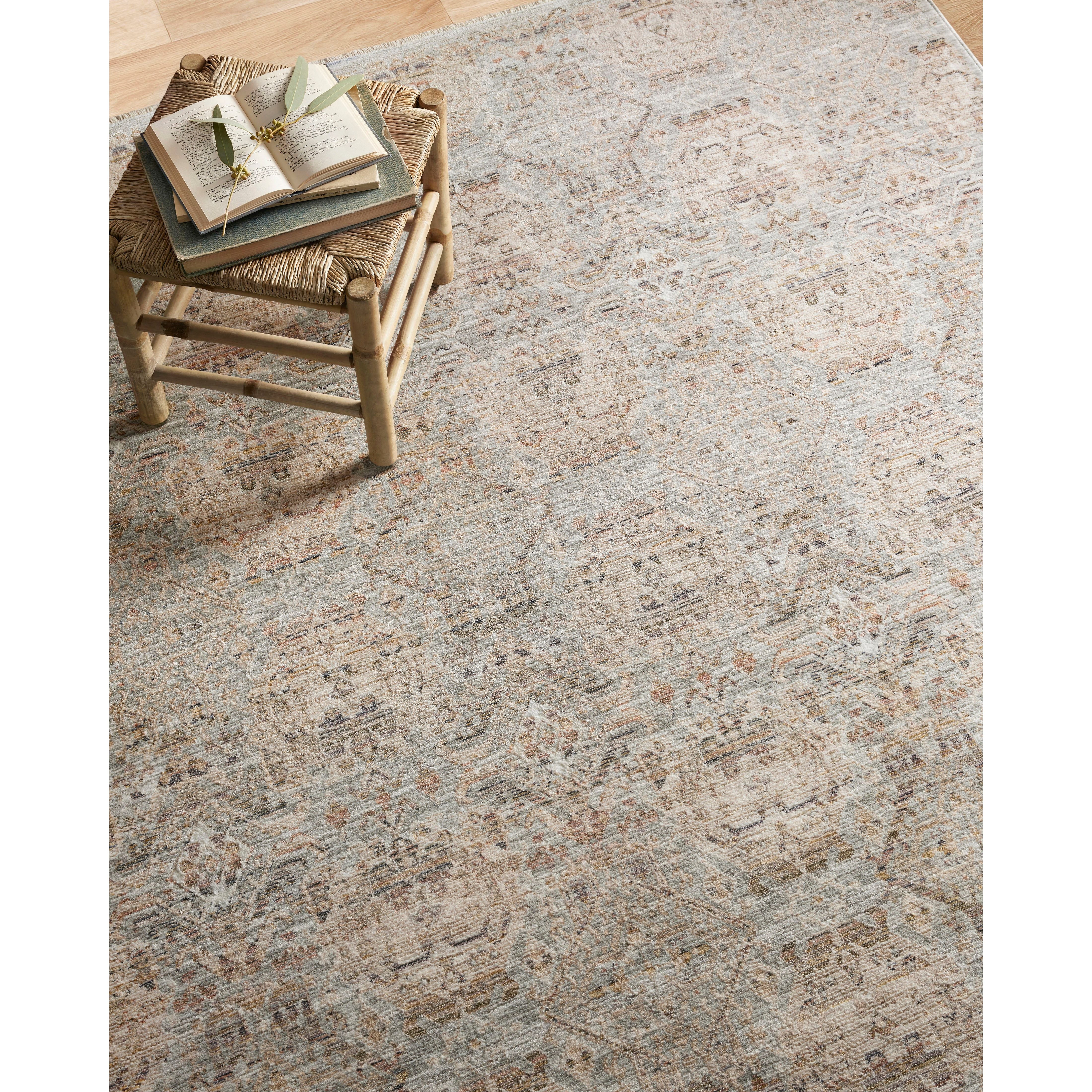 Stain-resistant, fade-resistant, and long-lasting, the Zuma Collection for Amber Lewis x Loloi features a soft pile in a serene grey, blue and ivory palette. Zuma also carries the Okeo-Tex® label, ensuring the rug's materials do not contain harmful substances. Power Loomed 100% Polyester Pile ZUM-05 AL Silver / Multi