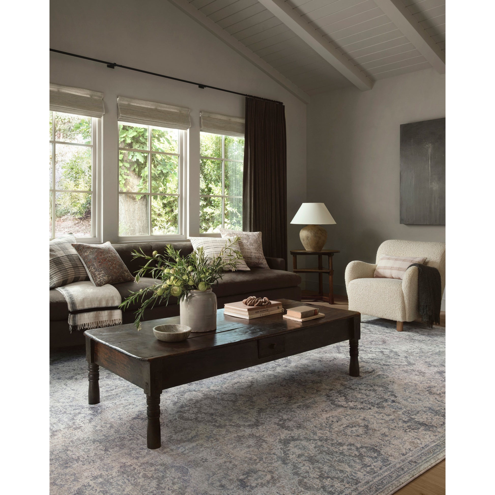Stain-resistant, fade-resistant, and long-lasting, the Zuma Collection for Amber Lewis x Loloi features a soft pile in a serene grey, blue and ivory palette. Zuma also carries the Okeo-Tex® label, ensuring the rug's materials do not contain harmful substances. Power Loomed 100% Polyester Pile ZUM-06 AL Pebble / Stone
