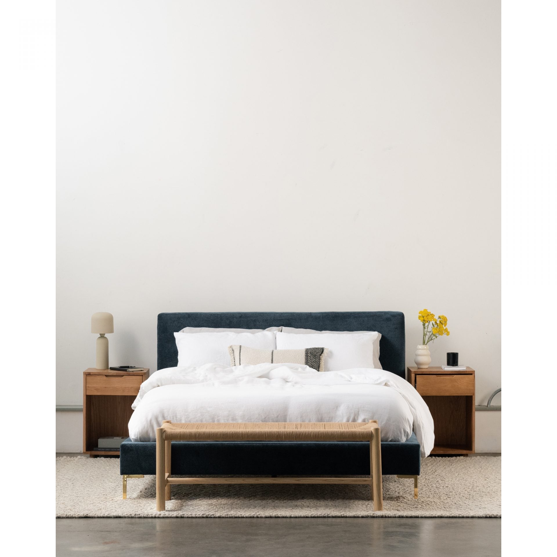 This Hawthorn Small Bench - Natural features a woven natural fiber that adds texture and an artisanal touch to any space. Versatile and natural, this is the perfect accent for the living room, the entrance hall, or at the end of your bed.  Dimensions: 48"W x 17"D x 18"H Seat Height: 18"  Materials:  Solid Elm Frame Woven Natural-Fiber Rope Seat