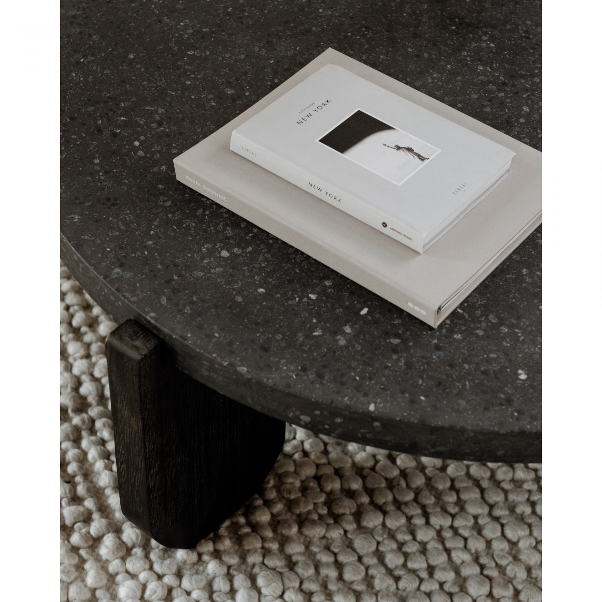 We love the oblong, funky legs of this Wunder Coffee Table. With a concrete top mixed with the acacia legs, this brings a unique, modern look to any living room or lounge area!   Dimensions: 38"W x 38"D x 14"H  Materials:  Concrete Top, Acacia leg 