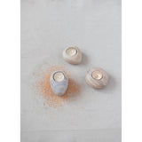 These Sandstone Tealight Holders add an organic ambiance -- the natural aspect of these sandstone tea lights make it a whole vibe. Pair together or one on its own.   Each one will vary.   Size: 4"L x 2.75 "W x 3.5" Round 