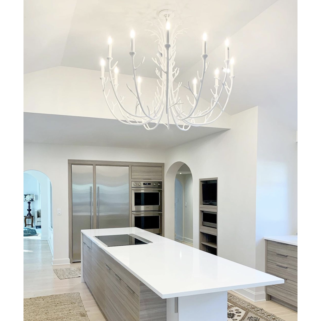 Featuring Silva Grande Chandelier by Visual Comfort at Amethyst Home. The protruding branches of this Silva Chandelier by Visual Comfort are stunning and would look fabulous in any dining room, entry, or other large area. 
Overall Dimensions: 48.25" L x 48.25" W x 37" HWeight: 104 lbs.  Amethyst Home provides interior design, new home construction design consulting, vintage area rugs, and lighting in the Salt Lake City metro area.